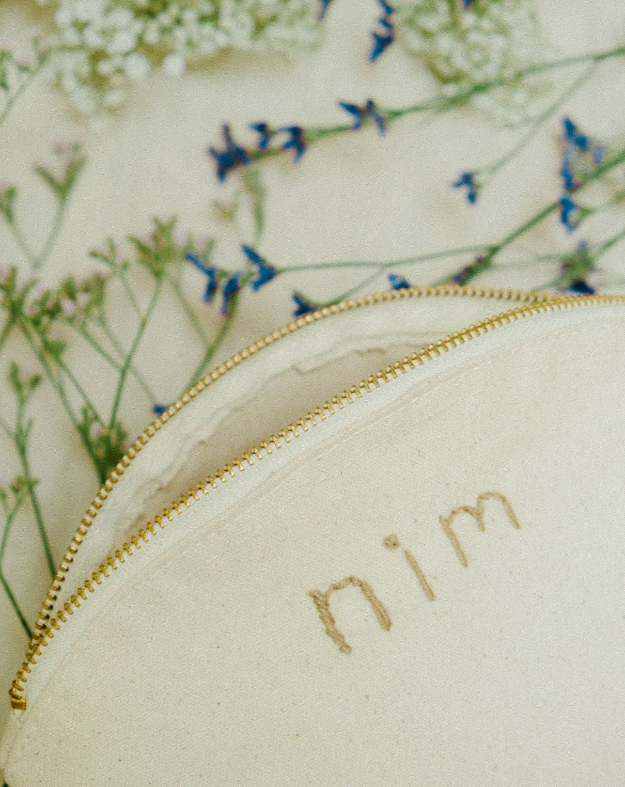 Nim hand embroidered canvas pouch